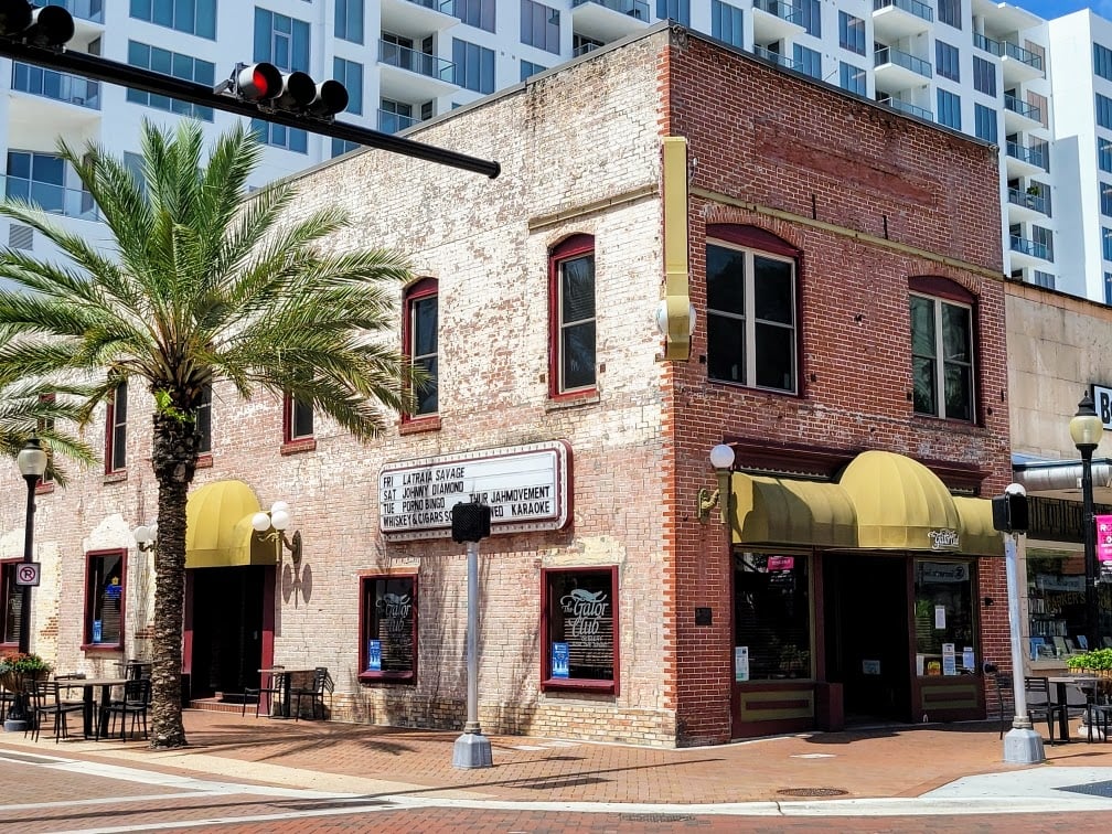 Worth's Block, the historic 1912 brick building housing The Gator Club on Main Street in Downtown Sarasota, Florida.
